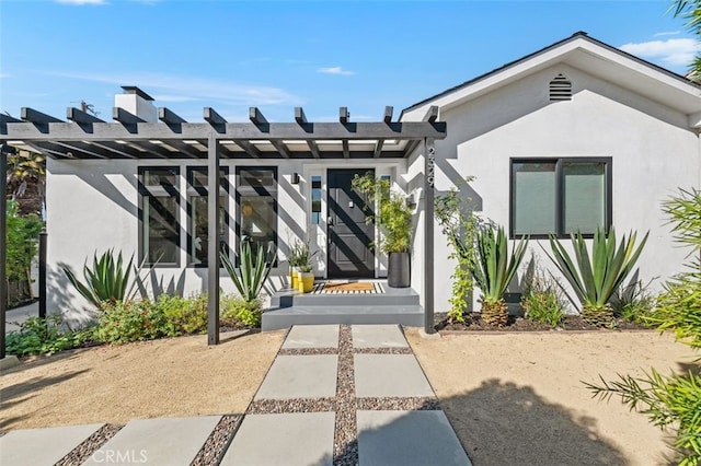 2329 Vineyard Ave, Los Angeles, CA 90016 - view of exterior entry featuring stucco siding