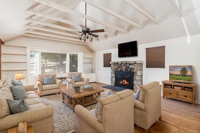 1211 Bridal Path, Rimforest, CA 92378 - living room with a stone fireplace, wood finished floors, ceiling fan, and built in features