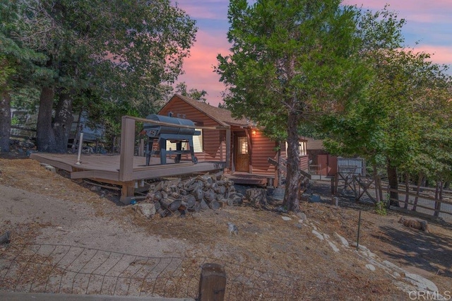 1211 Bridal Path, Rimforest, CA 92378 - view of front of property featuring a deck and log veneer siding