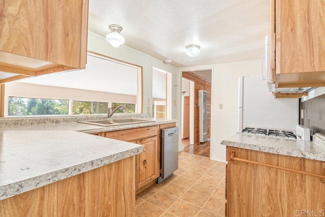 1211 Bridal Path, Rimforest, CA 92378 - kitchen with stainless steel dishwasher, tasteful backsplash, light countertops, a textured ceiling, and gas cooktop