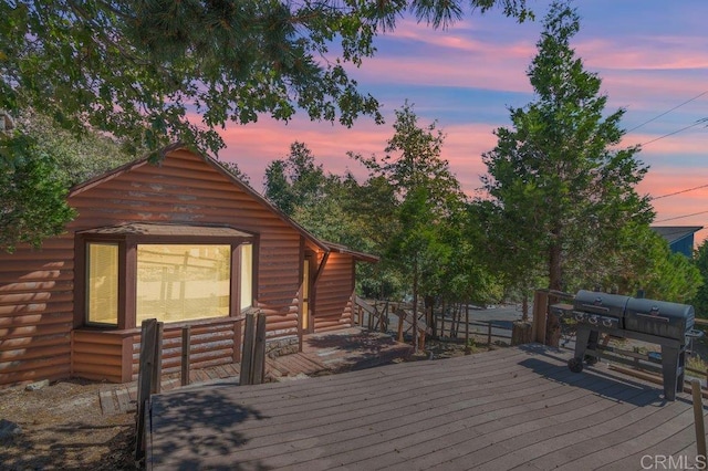 1211 Bridal Path, Rimforest, CA 92378 - deck at dusk featuring grilling area
