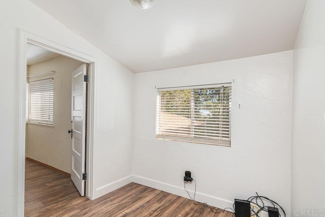 1211 Bridal Path, Rimforest, CA 92378 - empty room with dark wood finished floors and plenty of natural light
