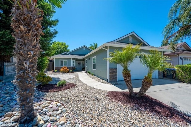 109 W Chestnut St, Nipomo, CA 93444 - ranch-style house featuring concrete driveway, a garage, and stone siding