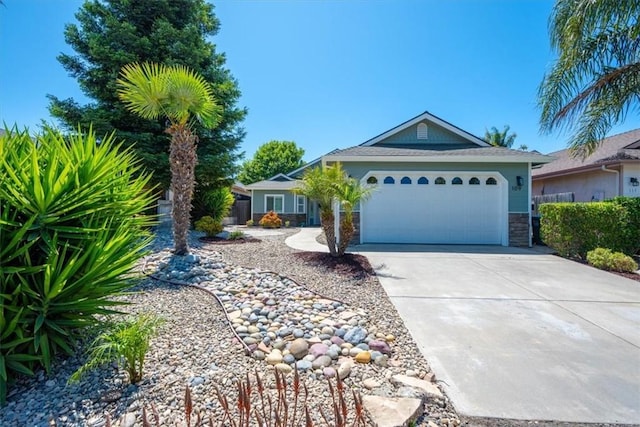 109 W Chestnut St, Nipomo, CA 93444 - single story home with driveway, stone siding, and a garage