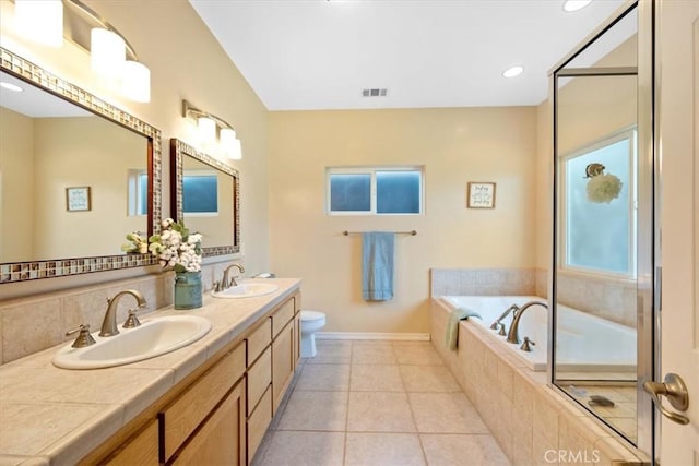 109 W Chestnut St, Nipomo, CA 93444 - full bathroom with double vanity, a garden tub, and tile patterned flooring