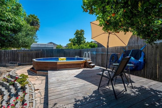 109 W Chestnut St, Nipomo, CA 93444 - wooden deck with a jacuzzi and a fenced backyard