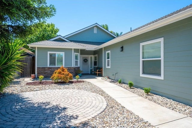 109 W Chestnut St, Nipomo, CA 93444 - view of exterior entry with a patio area and stone siding