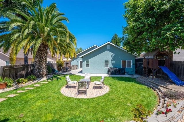 109 W Chestnut St, Nipomo, CA 93444 - fenced backyard featuring a patio area and a playground