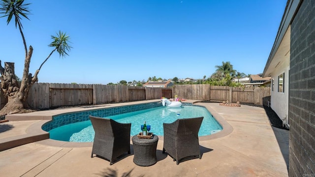 8865 Highsmith Ln, San Diego, CA 92119 - view of pool with a patio and a fenced backyard