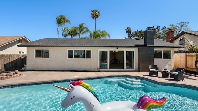 8865 Highsmith Ln, San Diego, CA 92119 - rear view of property with a patio, a chimney, and stucco siding