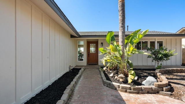 8865 Highsmith Ln, San Diego, CA 92119 - doorway to property with roof with shingles