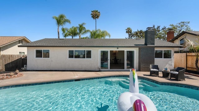 8865 Highsmith Ln, San Diego, CA 92119 - back of house featuring a chimney, a patio, and stucco siding
