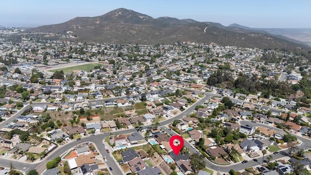 8865 Highsmith Ln, San Diego, CA 92119 - aerial view of property's location with a mountain backdrop and nearby suburban area