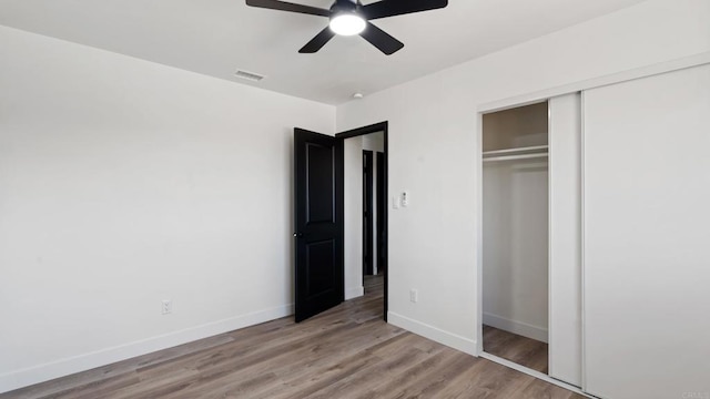 8865 Highsmith Ln, San Diego, CA 92119 - unfurnished bedroom featuring light wood-style floors, a closet, and ceiling fan