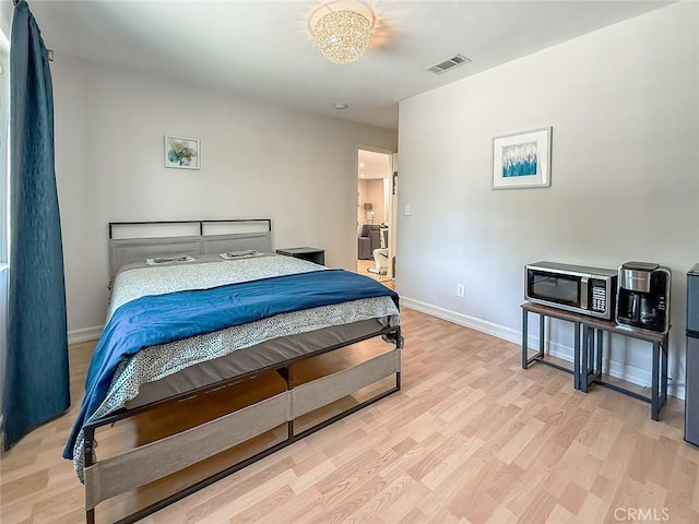 24017 Sylvan St, Woodland Hills, CA 91367 - bedroom with light wood-type flooring