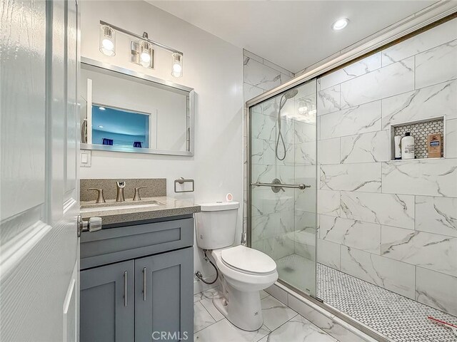 24017 Sylvan St, Woodland Hills, CA 91367 - full bath with marble look tiles, a marble finish shower, vanity, and recessed lighting