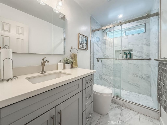24017 Sylvan St, Woodland Hills, CA 91367 - full bath with marble finish floors, vanity, and a marble finish shower