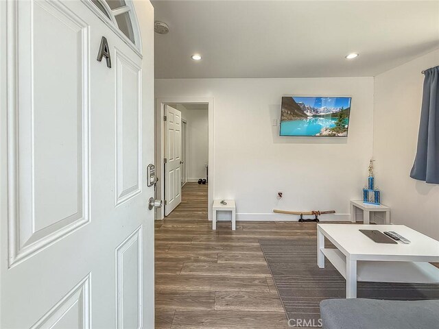 24017 Sylvan St, Woodland Hills, CA 91367 - living room with dark wood-type flooring and recessed lighting