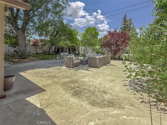 24017 Sylvan St, Woodland Hills, CA 91367 - fenced backyard featuring outdoor lounge area and a patio area