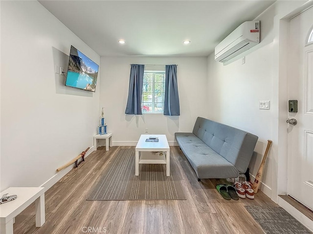 24017 Sylvan St, Woodland Hills, CA 91367 - living area featuring a wall mounted AC, wood finished floors, and recessed lighting