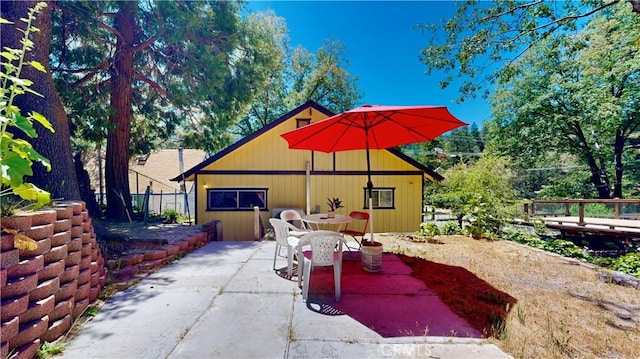 23728 Manzanita Dr, Crestline, CA 92325 - view of patio / terrace featuring outdoor dining space