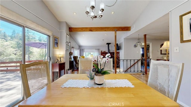 23728 Manzanita Dr, Crestline, CA 92325 - dining room with beamed ceiling and a chandelier