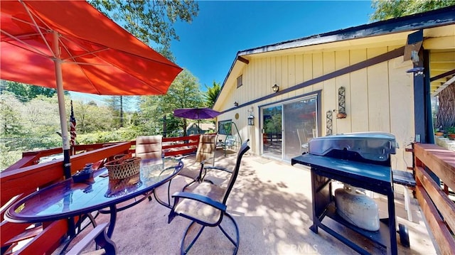 23728 Manzanita Dr, Crestline, CA 92325 - view of patio featuring outdoor dining area and area for grilling