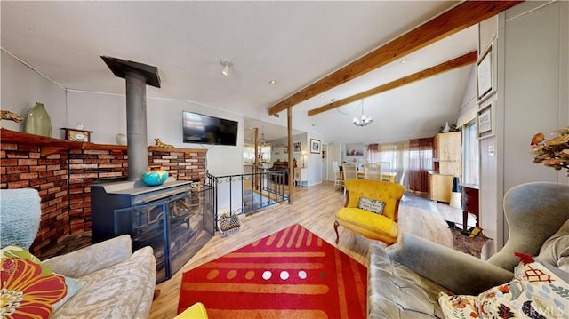 23728 Manzanita Dr, Crestline, CA 92325 - living area with wood finished floors, a chandelier, and beam ceiling