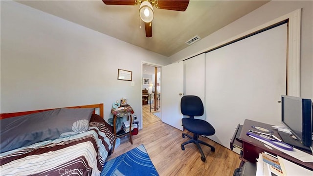 23728 Manzanita Dr, Crestline, CA 92325 - bedroom with wood finished floors and a ceiling fan