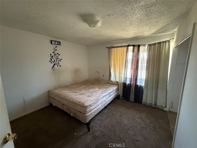 2073 Sandalwood Dr, Santa Maria, CA 93455 - carpeted bedroom with a textured ceiling