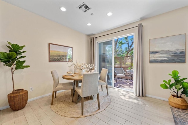 6104 Citracado Cir, Carlsbad, CA 92009 - dining space with light wood finished floors and recessed lighting