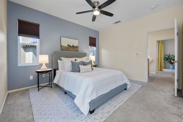 6104 Citracado Cir, Carlsbad, CA 92009 - carpeted bedroom with multiple windows and a ceiling fan