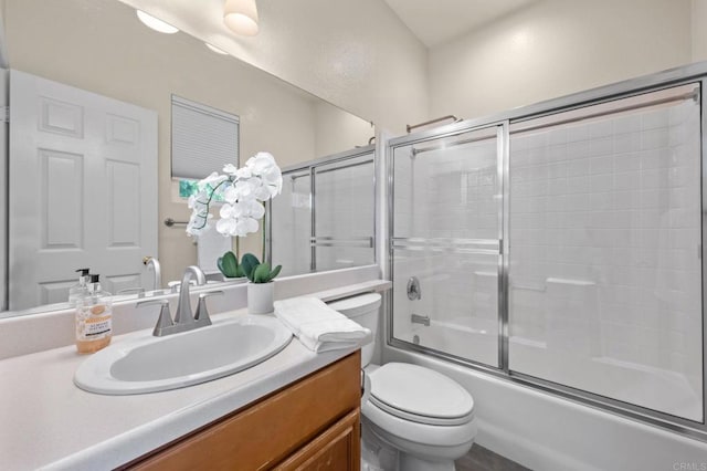 6104 Citracado Cir, Carlsbad, CA 92009 - bathroom featuring vanity and bath / shower combo with glass door