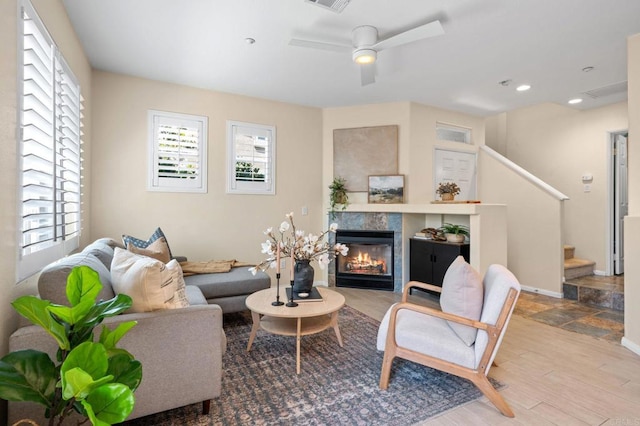 6104 Citracado Cir, Carlsbad, CA 92009 - living room featuring stairway, a tile fireplace, ceiling fan, recessed lighting, and wood finished floors