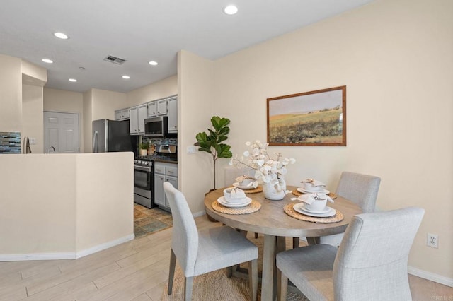 6104 Citracado Cir, Carlsbad, CA 92009 - dining room featuring light wood-style floors and recessed lighting
