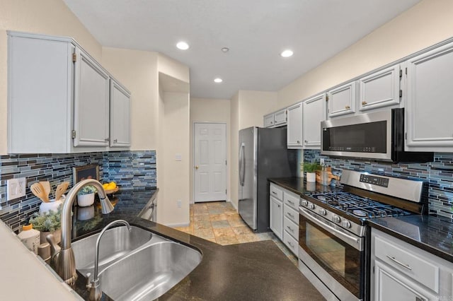 6104 Citracado Cir, Carlsbad, CA 92009 - kitchen with stainless steel appliances, backsplash, and recessed lighting
