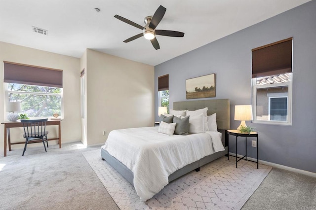 6104 Citracado Cir, Carlsbad, CA 92009 - carpeted bedroom with baseboards and ceiling fan