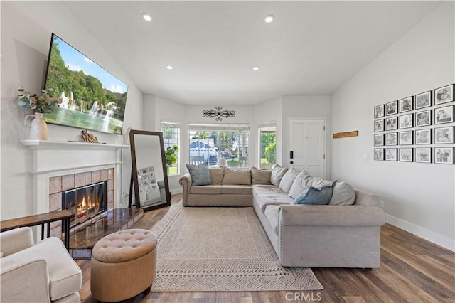 27724 Crookshank Dr, Saugus, CA 91350 - living room with wood finished floors, a fireplace, and recessed lighting