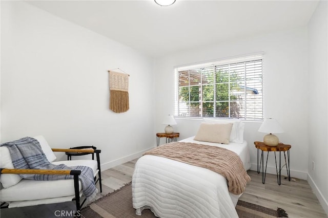7729 Sedan Ave, West Hills, CA 91304 - bedroom with light wood-type flooring