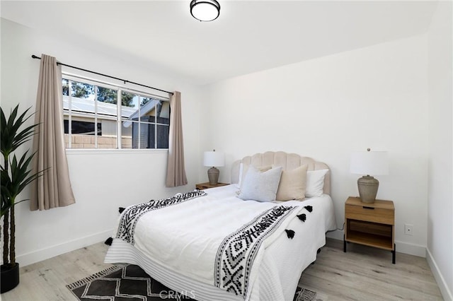 7729 Sedan Ave, West Hills, CA 91304 - bedroom featuring wood finished floors and baseboards