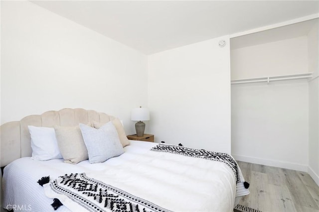 7729 Sedan Ave, West Hills, CA 91304 - bedroom featuring wood finished floors and baseboards