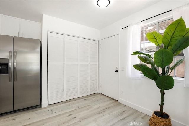 7729 Sedan Ave, West Hills, CA 91304 - interior space featuring light wood-style floors and plenty of natural light