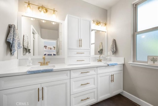 1638 Monterey Ave, Grover Beach, CA 93433 - bathroom with double vanity and baseboards