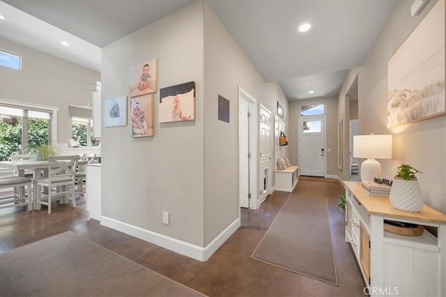 1638 Monterey Ave, Grover Beach, CA 93433 - hallway with plenty of natural light, recessed lighting, and finished concrete flooring