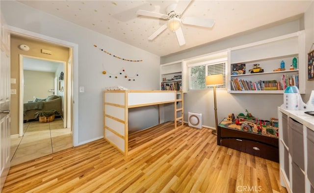 35147 Date Ave, Yucaipa, CA 92399 - bedroom with light wood-style flooring and ceiling fan