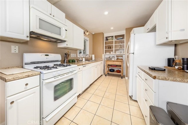35147 Date Ave, Yucaipa, CA 92399 - kitchen featuring white appliances, white cabinetry, light tile patterned floors, light countertops, and recessed lighting