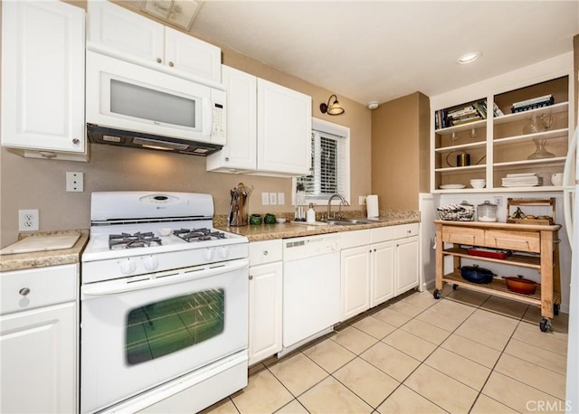 35147 Date Ave, Yucaipa, CA 92399 - kitchen with white appliances, light countertops, white cabinetry, light tile patterned floors, and open shelves