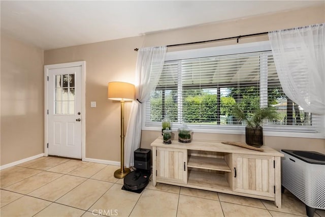 35147 Date Ave, Yucaipa, CA 92399 - foyer featuring light tile patterned floors and baseboards