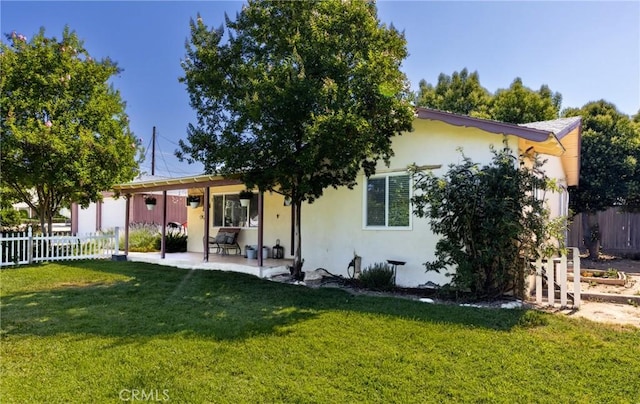 35147 Date Ave, Yucaipa, CA 92399 - back of property with a patio and stucco siding