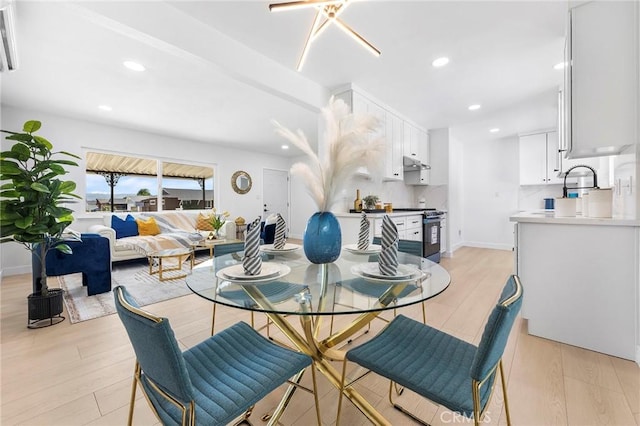 14537 Rath St, La Puente, CA 91744 - dining room featuring light wood-style flooring and recessed lighting